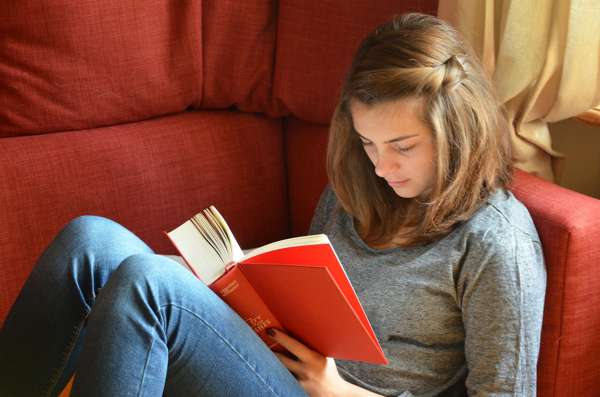 Brussels Belgian language student reading a book